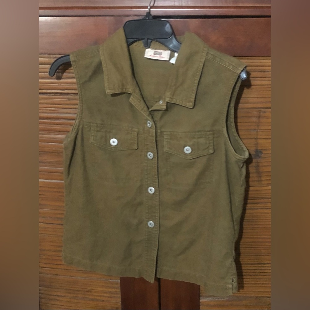 Olive green vest is cute alone or over a dressy or casual top.
